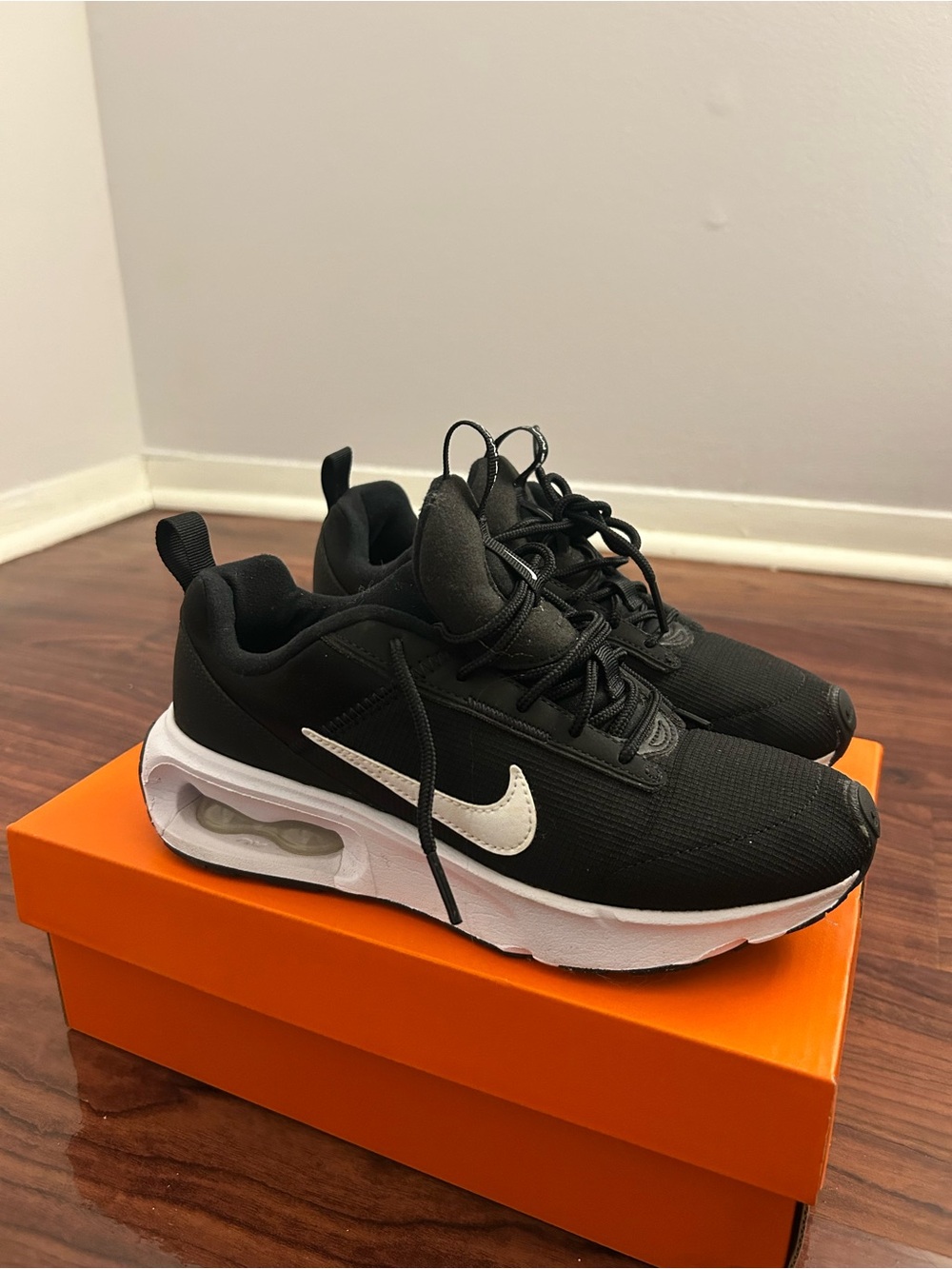 Nike Black And White Athletic Sneakers With Treaded Soles View 2